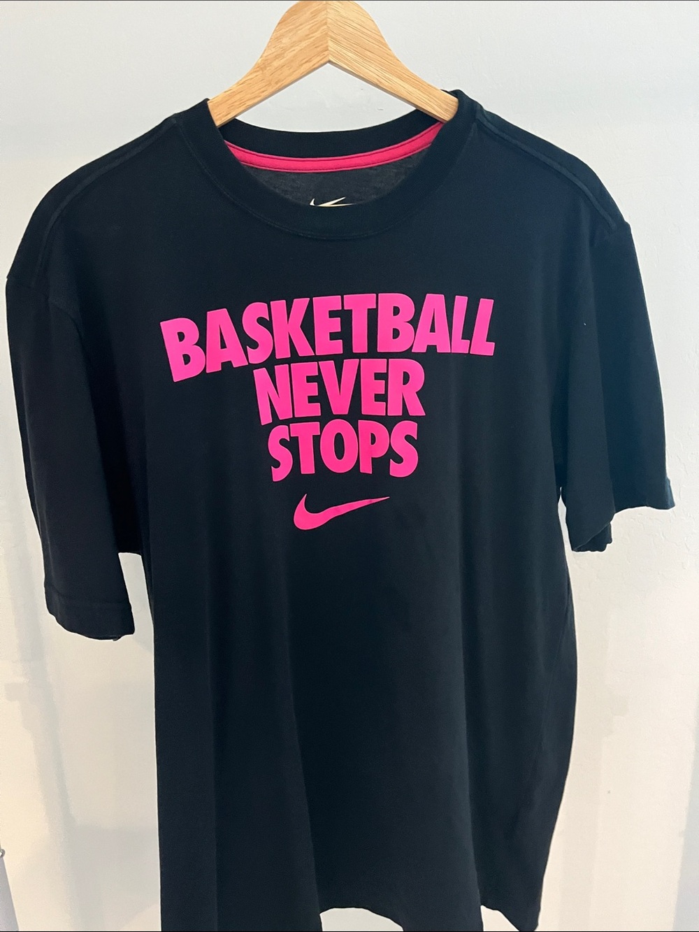 Nike Black Tee with Pink 'Basketball Never Stops' Graphic